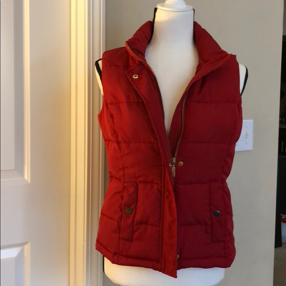 Red puffer vests with pockets
